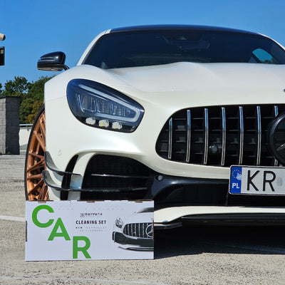 Box with car parked next to it
